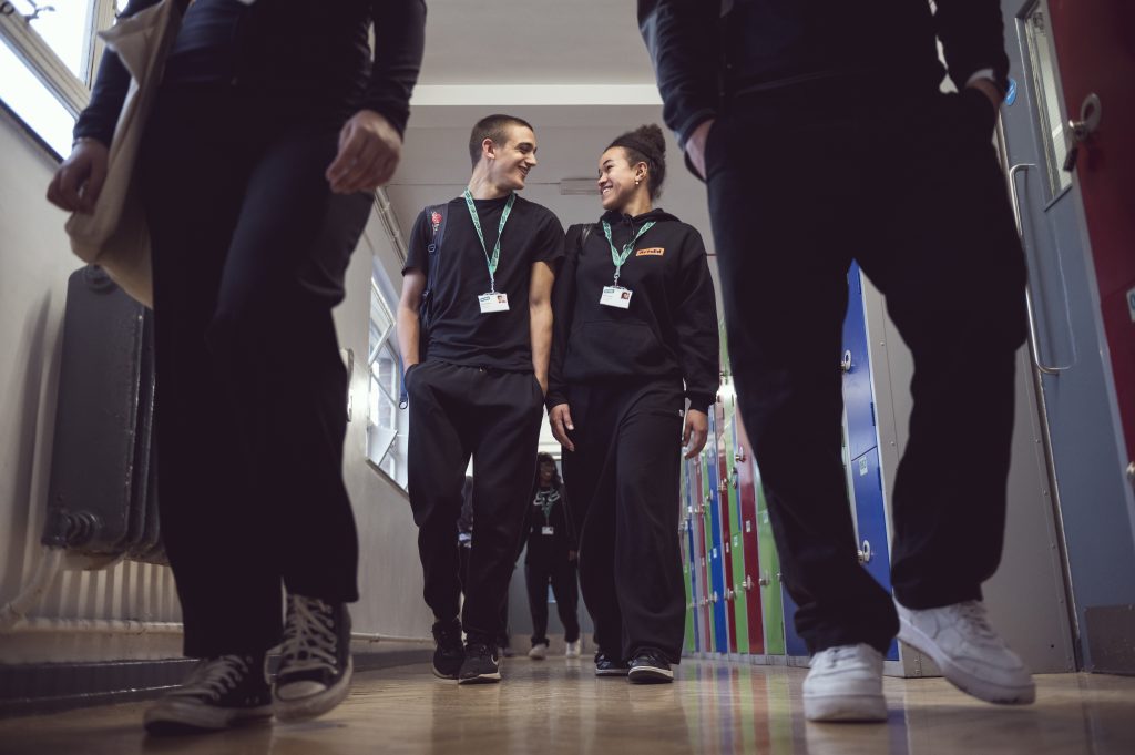 Acting Students walking down the corridor